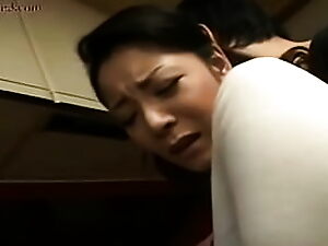 Asian mom and woman explore kitchen in nude
